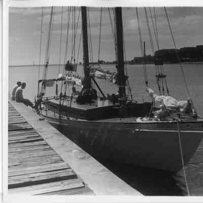 Two masted sailboat docked