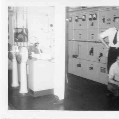 Three men by dockers off of Snyder 1953