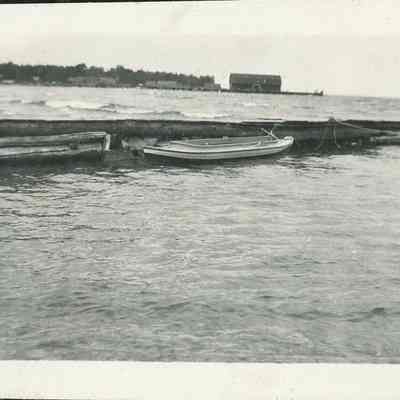 Duckboat tied to pier