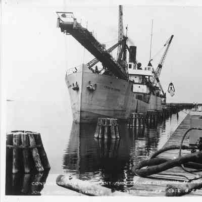 Fred W. Green unloading at dock