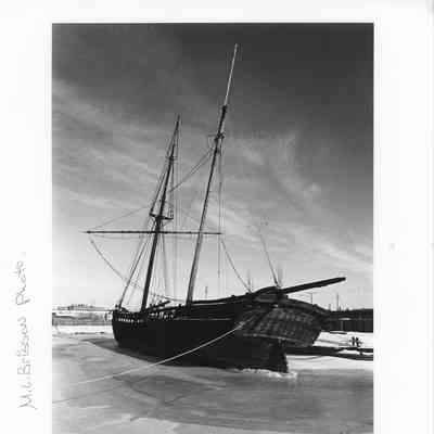 Alvin Clark in frozen water tied to ground