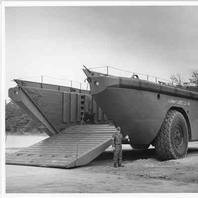Man standing next to US Army Larc LX49 with ramp down