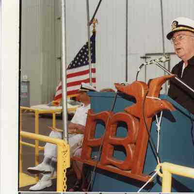Officer speaking at MCM-1 USS Avenger Launch