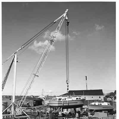 Ship hanging from crane