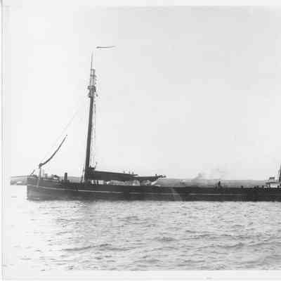 Schooner Verona being towed