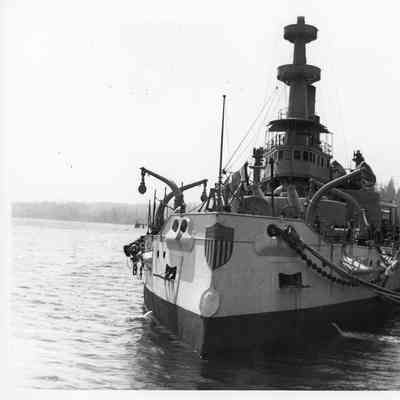 Metal ship with stars and stripe shield on bow