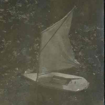 Toy sailboat in water