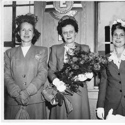 Alva Smith, Mrs. Robert L. Rote Sr., Mrs. C. Ray Christianson in office during christening of K-205 USS Poinsett