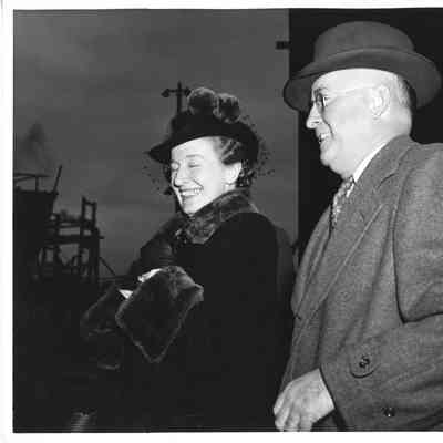 L.D. Smith and woman standing outside