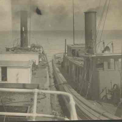 Ships tied alongside each other