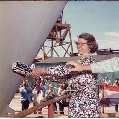 Woman about to christen PBI ship Oceanus