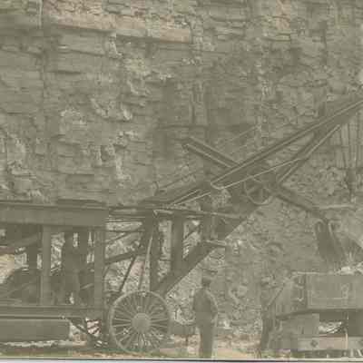 Steam shovel loading rock at quarry