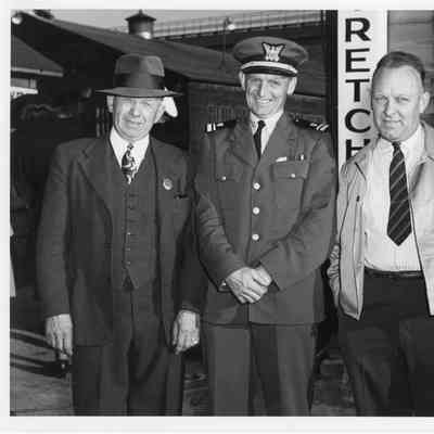 Captain John Roen and William Wolter with third man