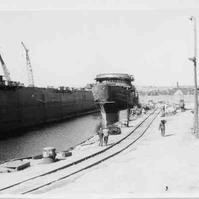 David Starr Jordan in water alongside large vessel May 1965