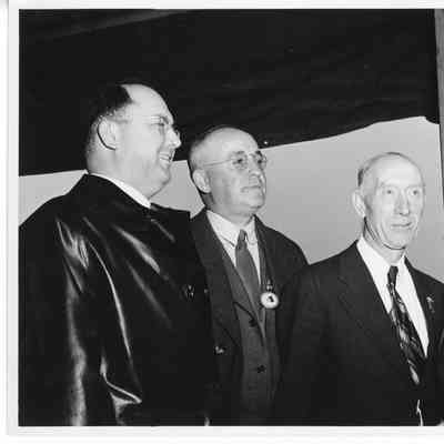 L.D. Smith and unidentified men