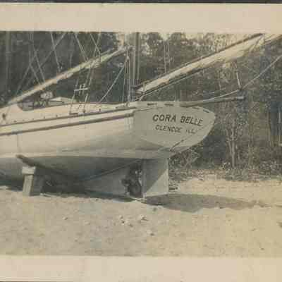 Sailboat Cora Belle beached 1919