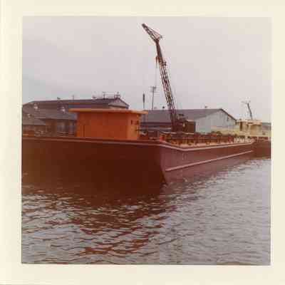 front view of dump scow Mary P. in water May 1959