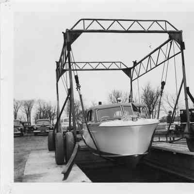 Boat in lift at Baudhuin Yacht Harbor