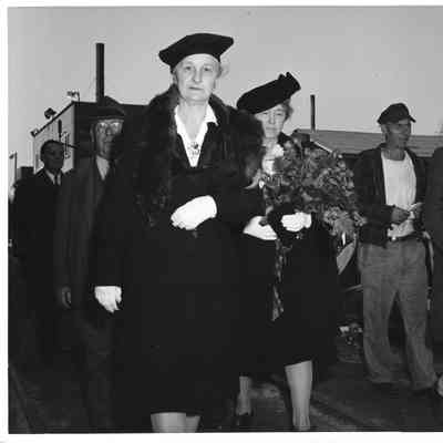 Mrs. William E. Wagener holding roses