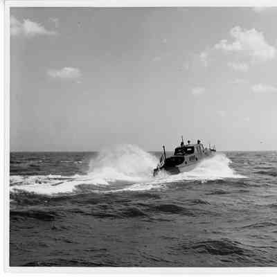 US Army P-299 underpower driving towards right side horizon