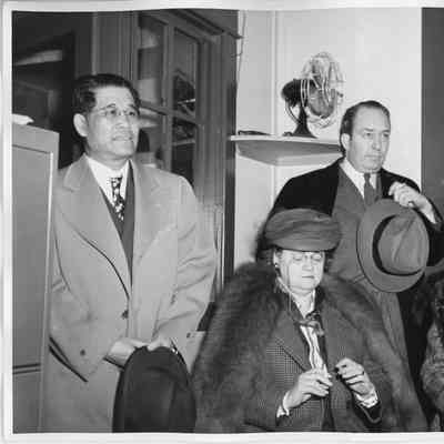 Four people at Clement T. Jayne ship launching