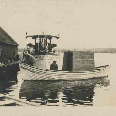 Two men on launch 1918