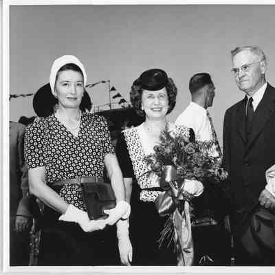 Mrs. Lawrence H. Smith holding roses