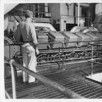 Man in J.R. Sensibar engine room