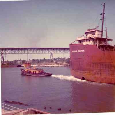 Tug Adrienne B towing freighter National Trader
