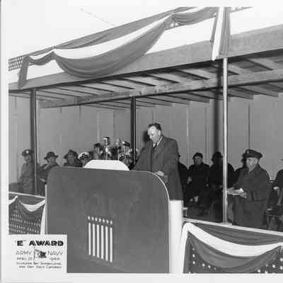 W. Wolter is speaking at Army/Navy E award April 20, 1944