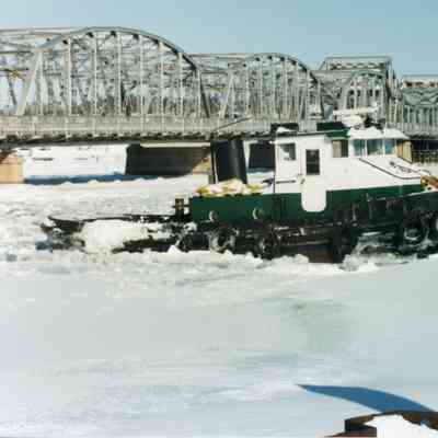 Sharon M. Selvick docked next to Michigan Street Bridge