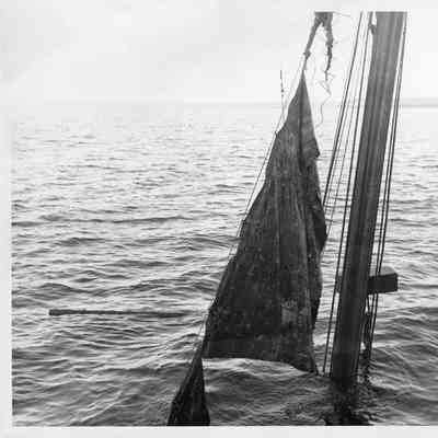 Sailboat being raised from the water