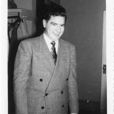 Ensign Neil Bender at naval Christmas office party December 1952