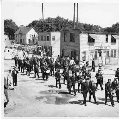 American Legion Band marching through L.D. Smith yard