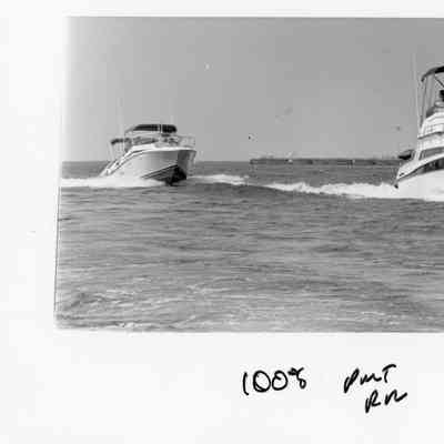 2 boats with smaller boat on left 1996