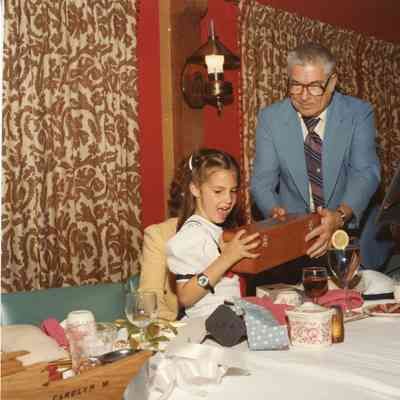 Child and man at Carolyn M launch dinner