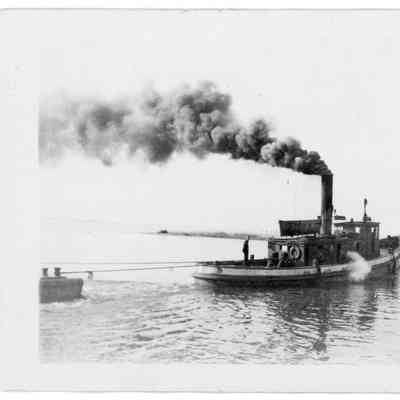Bob Teed towing barge in Bay of Green Bay