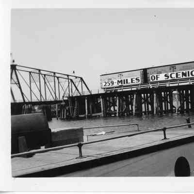 Railroad cars on trestle of Leathem and Smith bridge