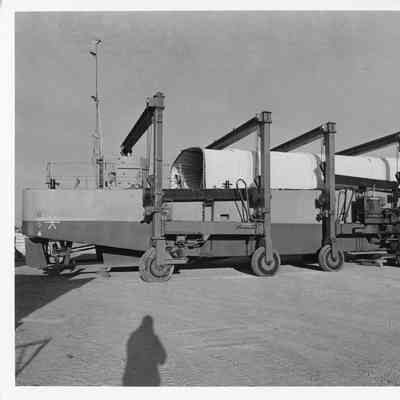 Two Travelifts holding landing craft