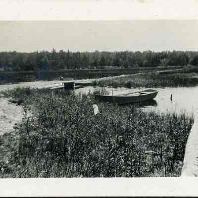 Rowboat tied to shore in state park 1916