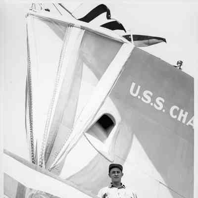 Unidentified workmen at christening of unknown ship