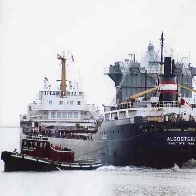 Algosteel being towed by the tug South Carolina 2004