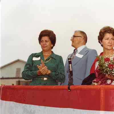 Two women and Ellsworth Peterson during christening of Napolean