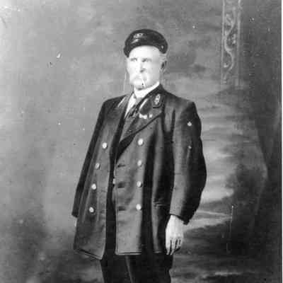 Lighthouse keeper Jesse Brown standing in Uniform