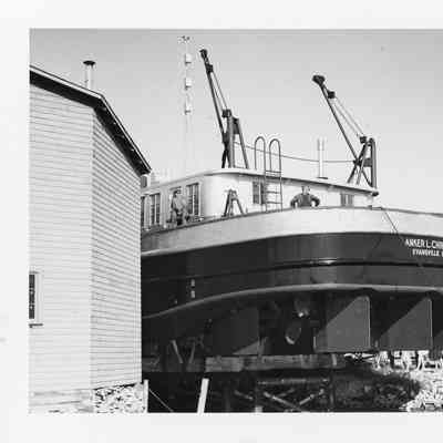 Push Tug Anker L. Christy on wooden platform