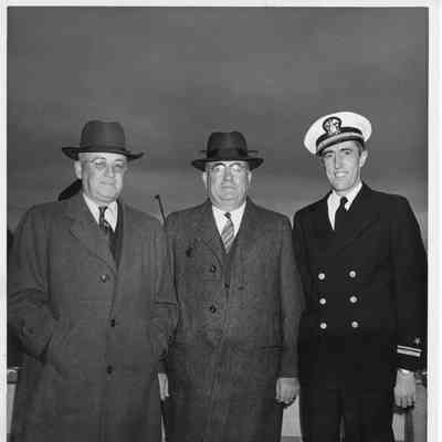 L.D. Smith with two men