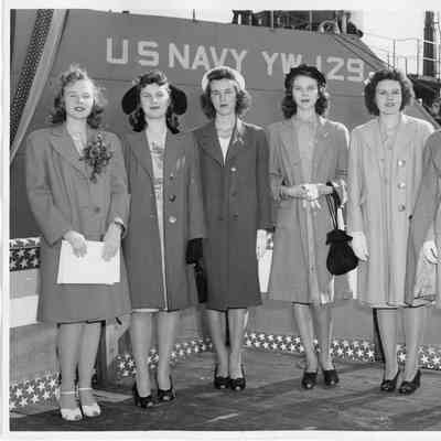 Patsy smith and five girls Standing in front of US Navy YW-129