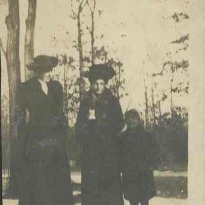 two women and a boy