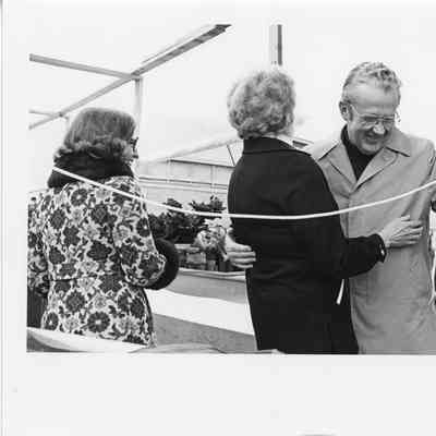 PBI Bob Peterson and two women at Christening