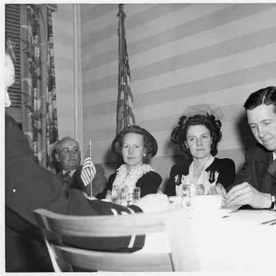 L.D. Smith and Alva Smith with two people at table